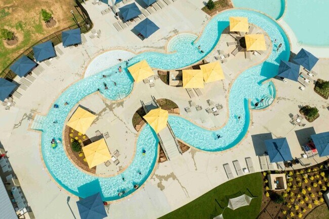 Building Photo - Now Leasing in Sunterra with Top-Tier Amenities