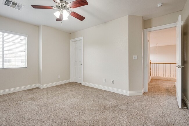 Building Photo - Spacious 3-Bedroom Home Featuring Downstai...