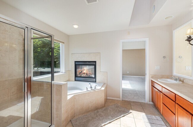Building Photo - Stylishly updated 4 BedroHome in Park at C...