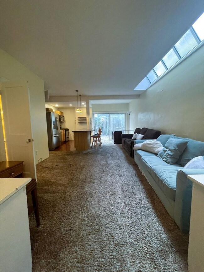 Building Photo - One Block to the Diag! Charming Home with Private Courtyard + Parking