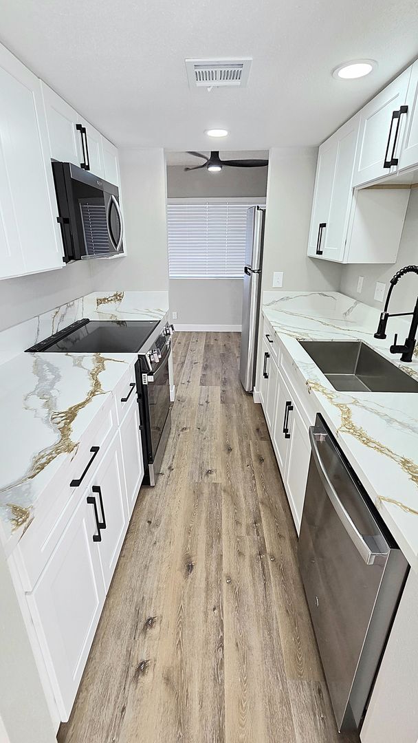 Building Photo - NEWLY RENOVATED & MODENIZED 2ND FLOOR CONDO IN SPRING VALLEY