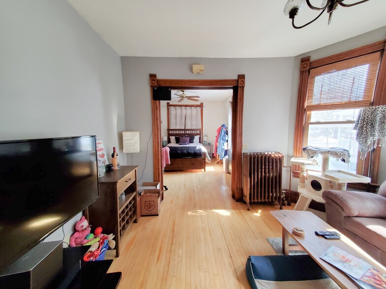 Living Room looking to bedroom 1 - pocket doors separate. - 373 Daly St