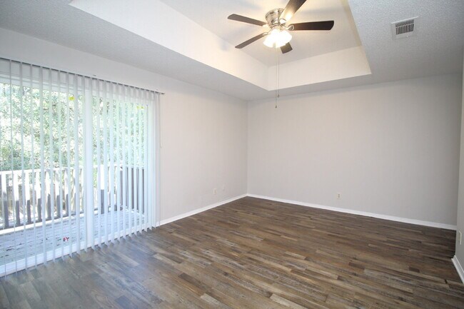 Building Photo - Spacious 3BR Townhome Near Pensacola State College with Flex Room, Private Balcony & Fenced Backy...