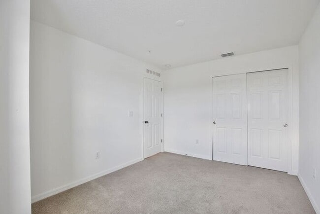 Building Photo - Luxurious 3/2.5 Modern Townhome with a Private Balcony and a 2 Car Garage in the Exclusive Gated ...