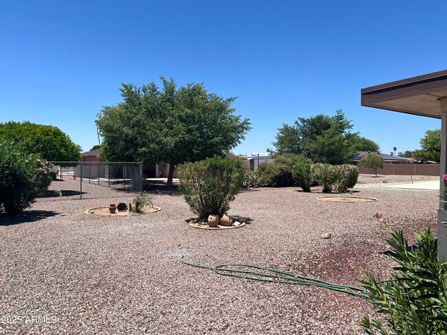 Building Photo - 9221 W Briarwood Cir N