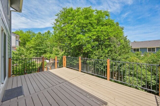 Building Photo - Spacious 4BR Home with Finished Basement, Private Yard & Community Amenities