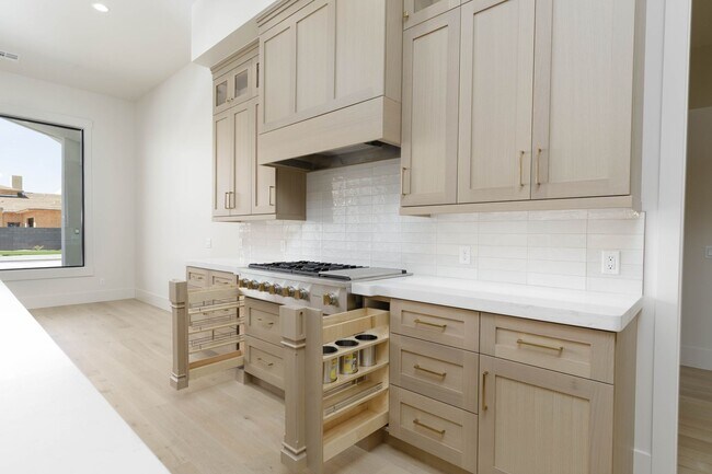 Building Photo - Gorgeous Custom Single Story with RV Garage