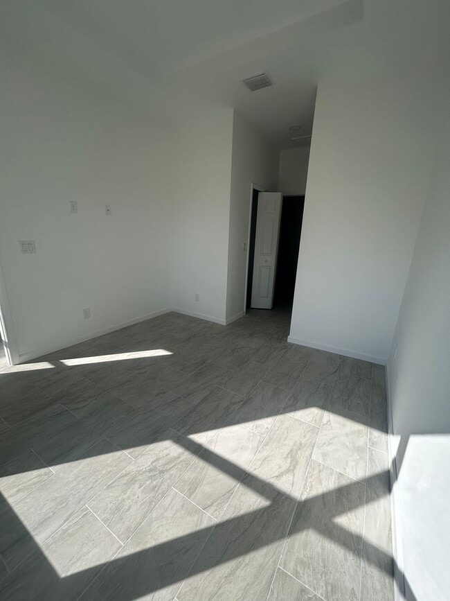 Building Photo - BRAND NEW CONSTRUCTION- 4 Bedroom 2 Bath-2 Car Garage-Serene Lake Placid Location