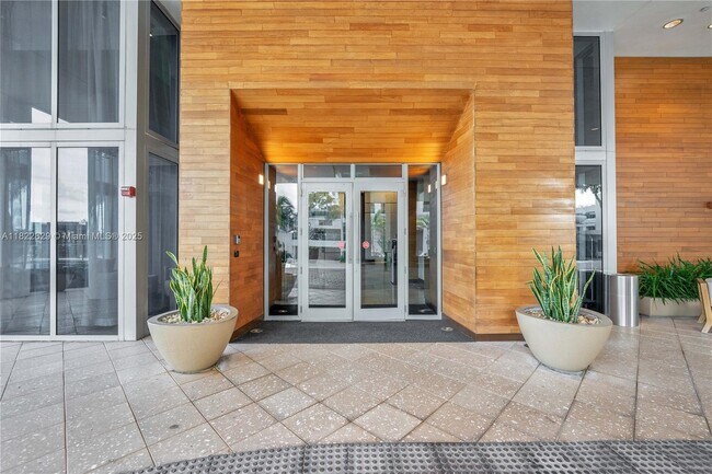 Building Photo - 6899 Collins Ave