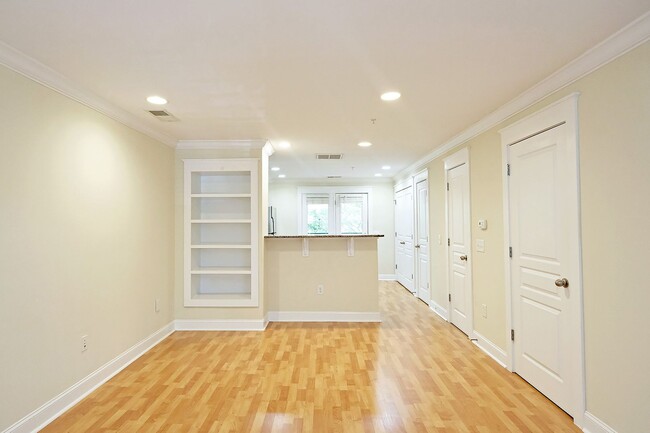 Building Photo - Move-In Ready! Pet-Friendly Woodlands Condo with Community Amenities