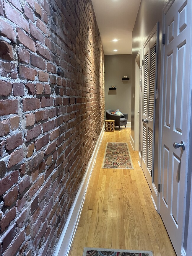 Exposed brick hallway - 1718 U St NW