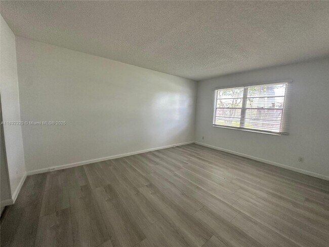 Building Photo - 12850 SW 4th Ct