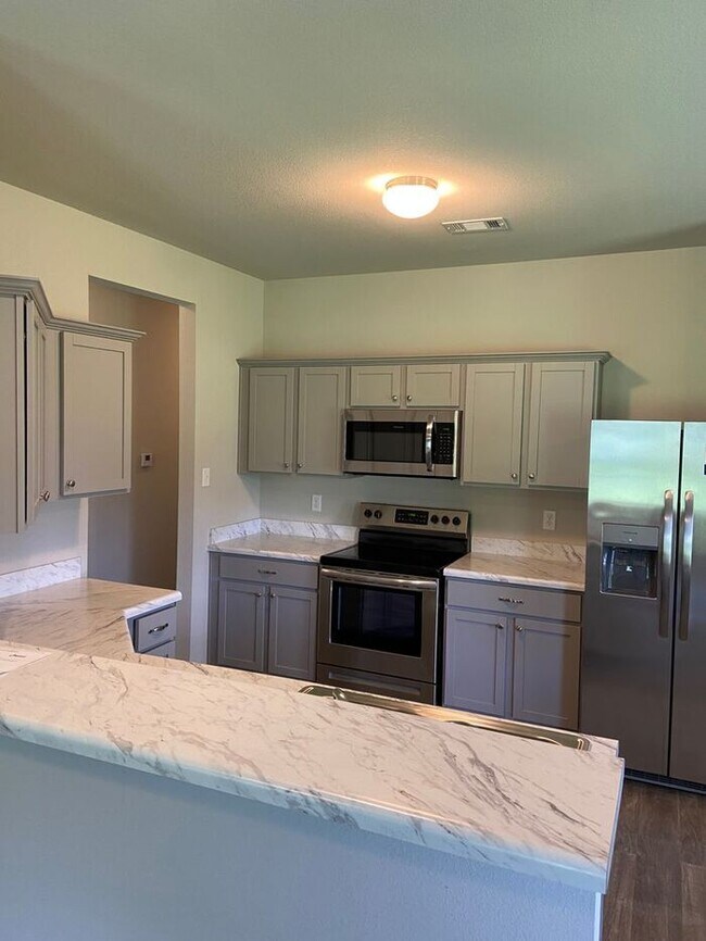 Building Photo - BRAND NEW Three Bedroom | Two Bath Home in...