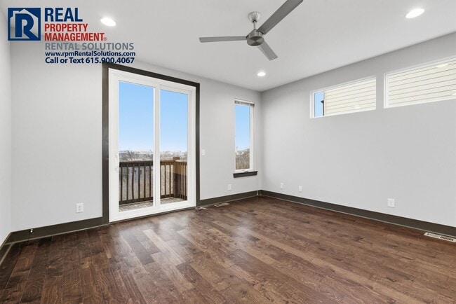 Building Photo - Lovely 2BR/1.5BA end unit townhome 5 mins from Downtown Nashville with washer/dryer included!