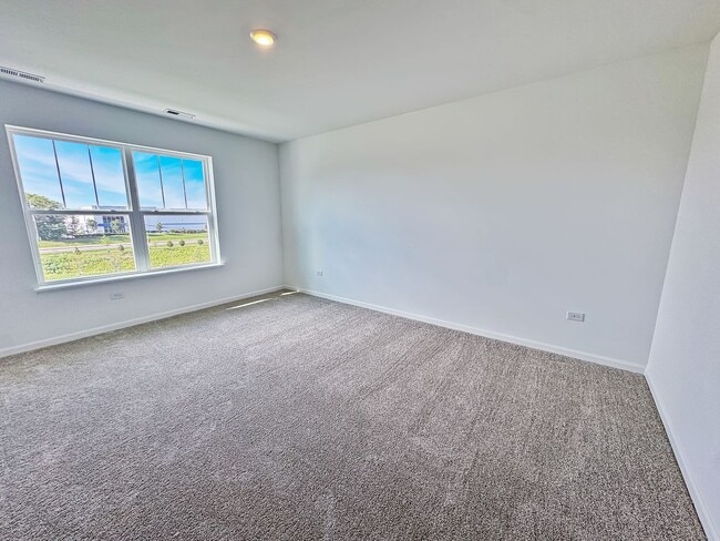 Building Photo - Step into modern living with this brand-ne...