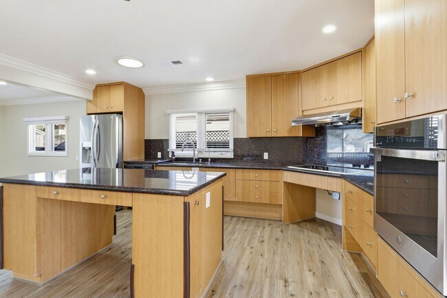 Building Photo - Turnkey Open-Concept Home with Central A/C & Solar