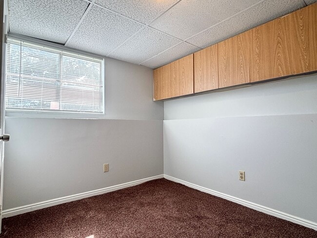 Building Photo - Cozy Home with New Paint & Flooring!