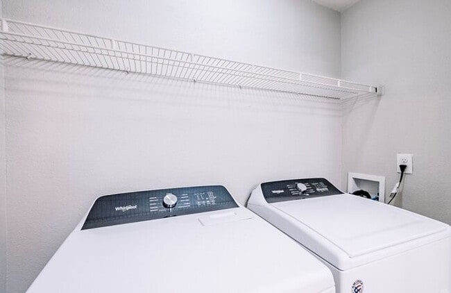 Building Photo - Spacious 2-Bedroom Elite Apartment with Private Balconies & Washer/Dryer