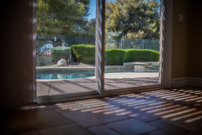 Relaxing view from breakfast nook to the pool - 2850 Bronzino Ct