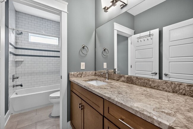 Building Photo - Beautiful 4 Bedroom in The Nations