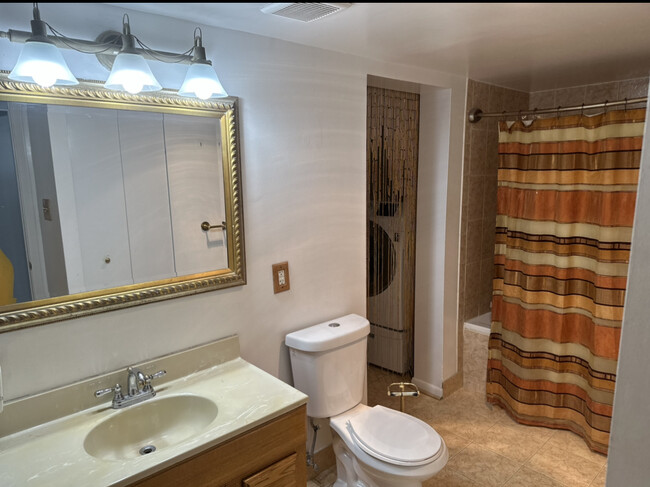 Bathroom with full laundry room - 9200 Edwards Way