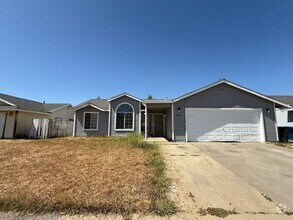 Building Photo - Spacious 4bed 2bath home in the Rio Linda/...