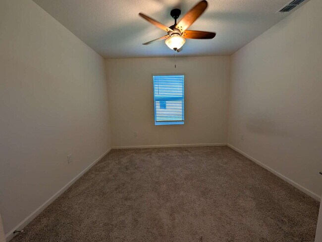 Building Photo - Modern 4-Bedroom Home with Large Backyard in Quiet SW Palm Bay – Available Mid-June