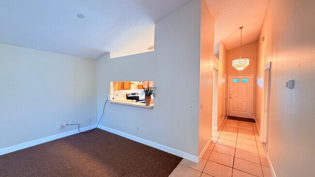 Building Photo - Bright 3/2 Home Near UCF with Vaulted Ceilings & Spacious Backyard!