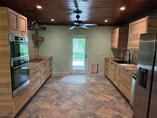 Building Photo - Waterfront Oasis Awaits!  3/2 with Attache...