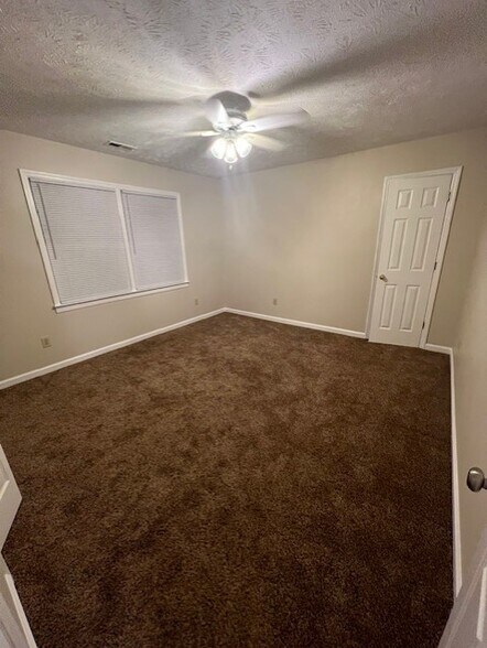 Master bedroom with large double closet and a smaller second closet - 100 Twin Acres Dr