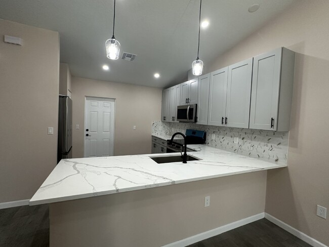 Building Photo - "Spacious 3-Bed, 2-Bath Duplex Retreat on ...