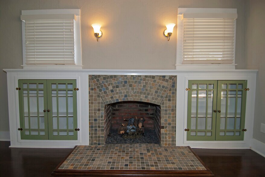 Gas Fireplace with Built-in Curio Cabinets - 60 W Lewis Ave