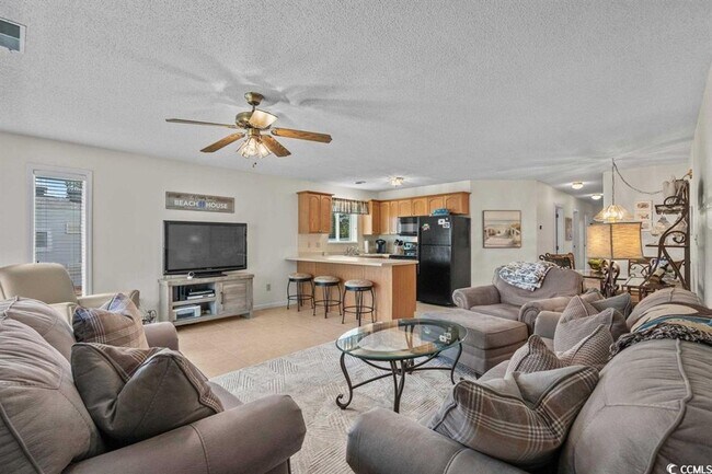 Building Photo - Ground floor, 2 bedroom, 2 bath, end unit- 10 mins to Surfside Beach.