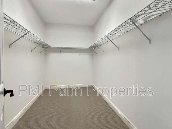 Building Photo - 9870 SW Trumpet Tree Cir