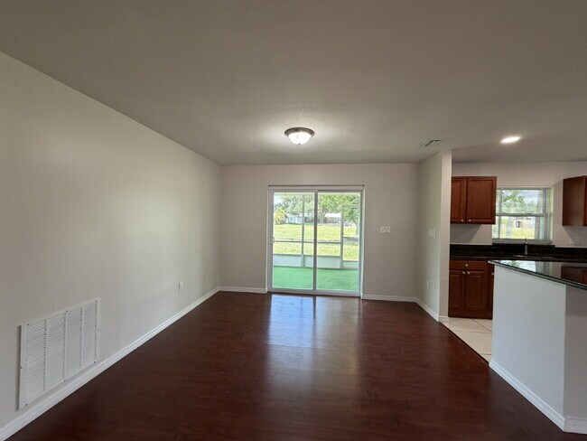 Building Photo - "Charming 3-Bedroom Home with Gleaming Hardwood Floors!"