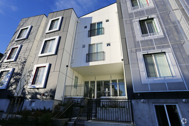 Building Photo - The Den Apartments