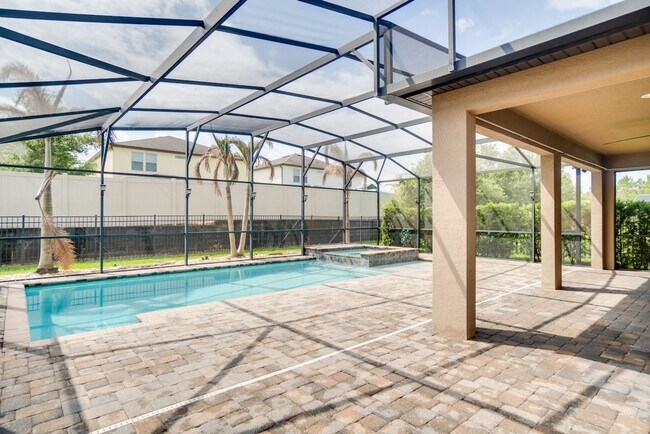 Building Photo - Stunning 3-Bedroom Pool Home with Bonus Room in the Gated Community of Lakeshore at Narcoossee