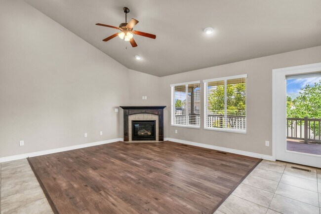 Building Photo - Spacious Syracuse Home with Covered Deck, Loft & Oversized 3-Car Garage