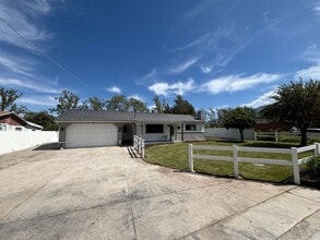 Building Photo - Beautifully Renovated 4-Bedroom Home with Finished Basement