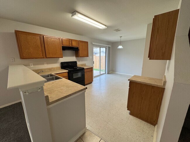 Building Photo - SPACIOUS 4 BR ON A CUL-DE-SAC W/ 2 LIVING AREAS & 2 EATING AREAS*STORAGE SHED*COVERED PATIO*EASY ...