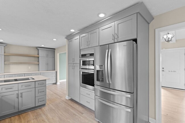 Building Photo - AVAILABLE NOW! Waterfront Living in Carmel! Paddle boat included!