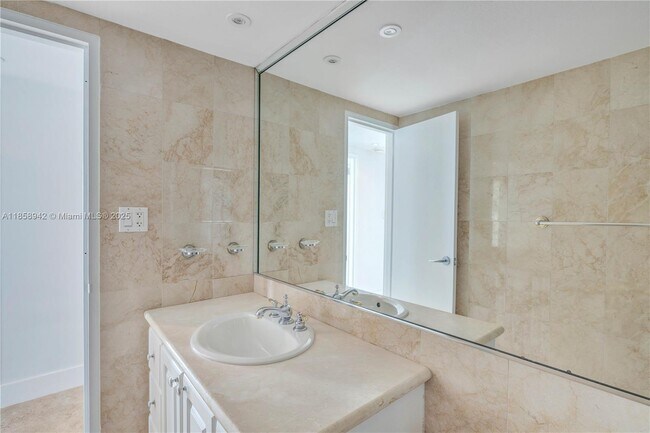 Building Photo - 5151 Collins Ave