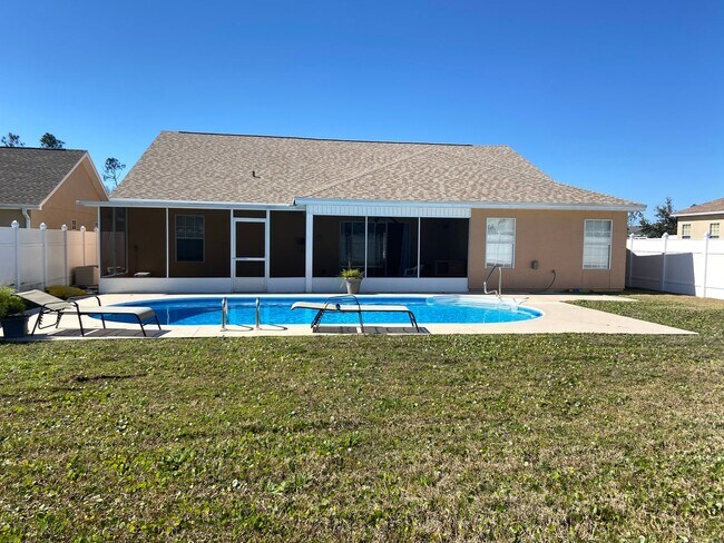 Building Photo - Beautiful home with Swimming Pool in the Hammocks. 4 bedroom 2 bath -Pool lawn service included!!!