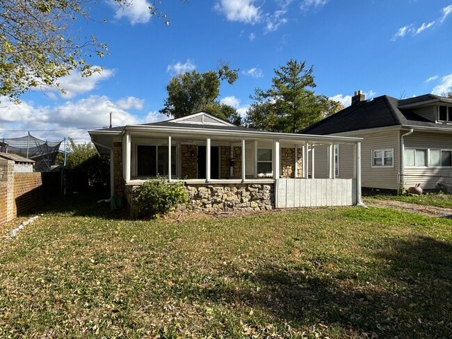 Primary Photo - 4 Bed, 1.5 Bath Pet-Friendly Home with Fully Fenced Backyard