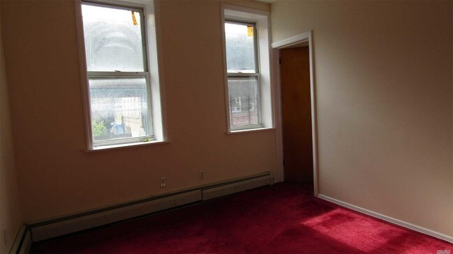 Building Photo - 108-23 Jamaica Ave