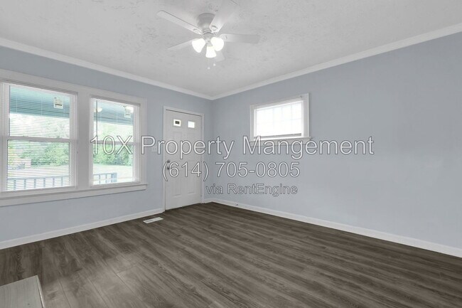Building Photo - 1311 E 24th Ave