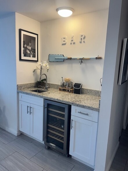 Bar features Sink, Storage & Bosch Wine Cooler - 16531 NE 35th Ave