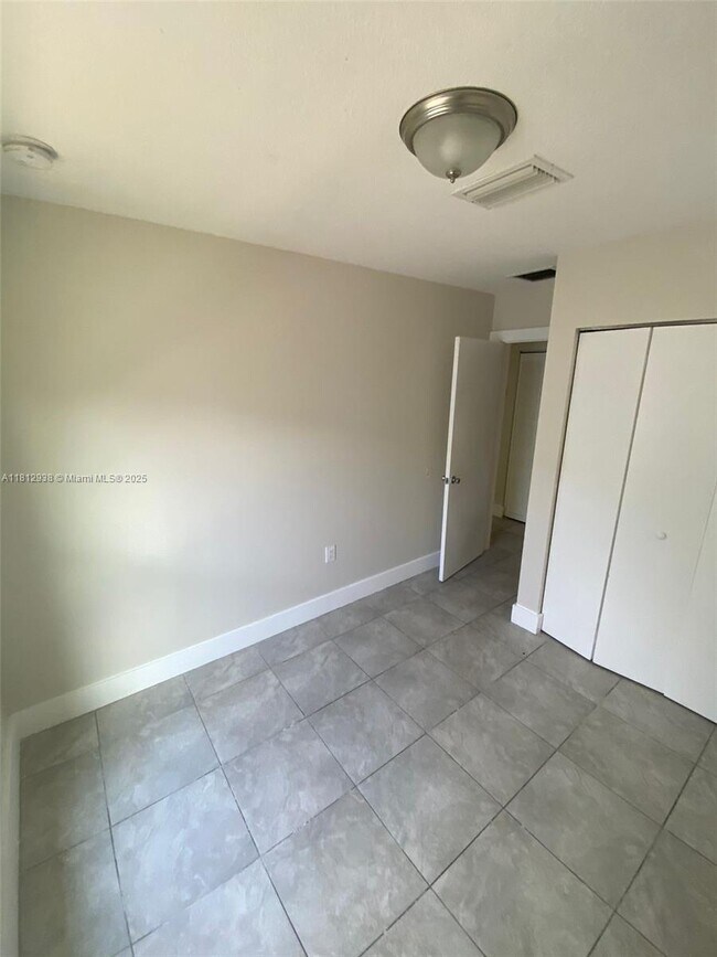 Building Photo - 5447 NW 5th Ct