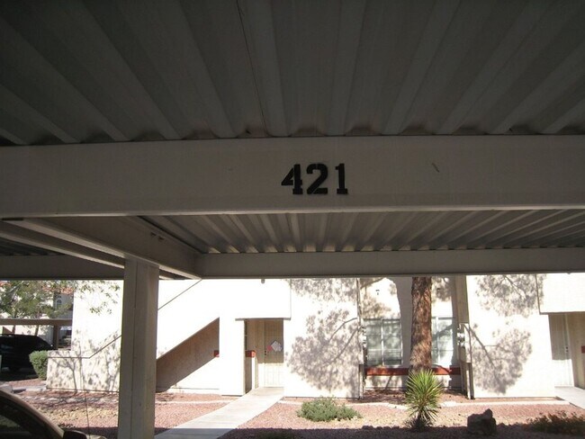 Building Photo - 2nd Story Condo in gated community close to the pool.