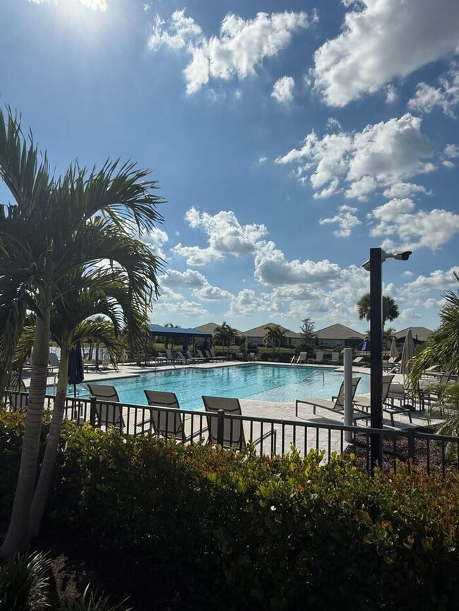 Building Photo - 2BR 2BA Home w/ Quartz Island Kitchen + Pond View Lanai + 2-Car Garage in Lakewood Ranch